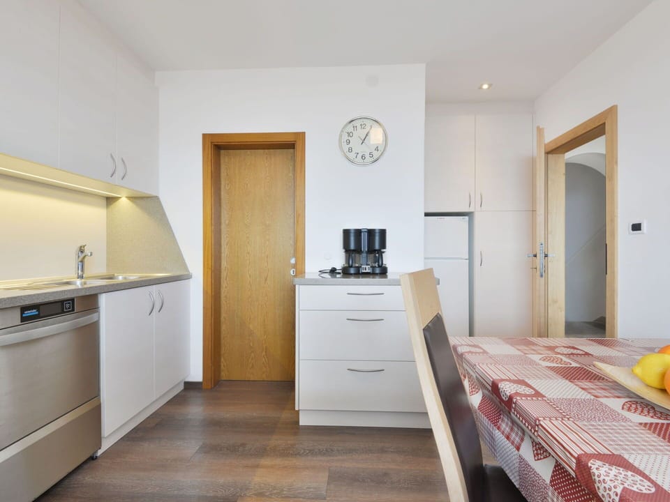 Furniture, Flooring, Interior Design, Floor, Wood, Room, Ceiling, Cabinetry, Countertop, Kitchen