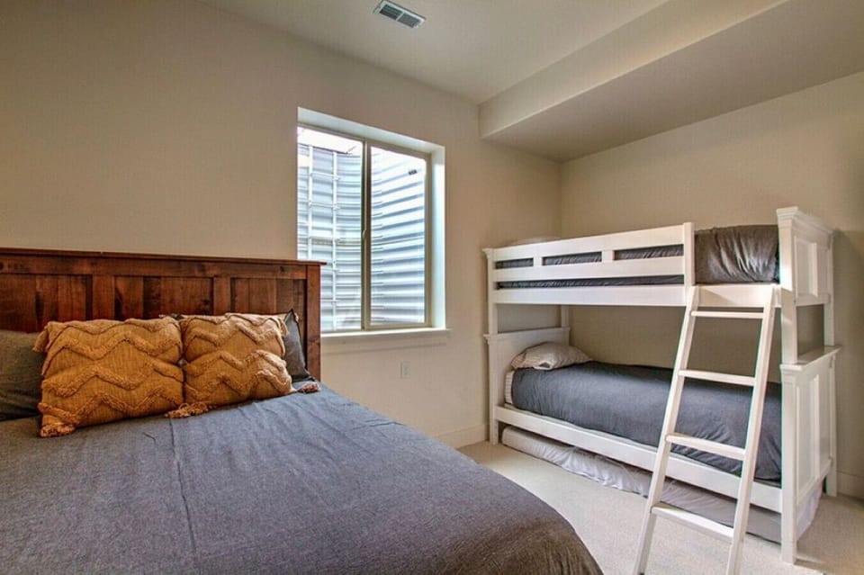 Downstairs bedroom 3 with queen bed and twin bunk (and two twin trundles)