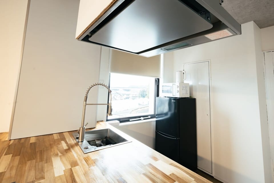 Comfort Triple Room, Non Smoking, Kitchen | Private kitchen | Shared microwave