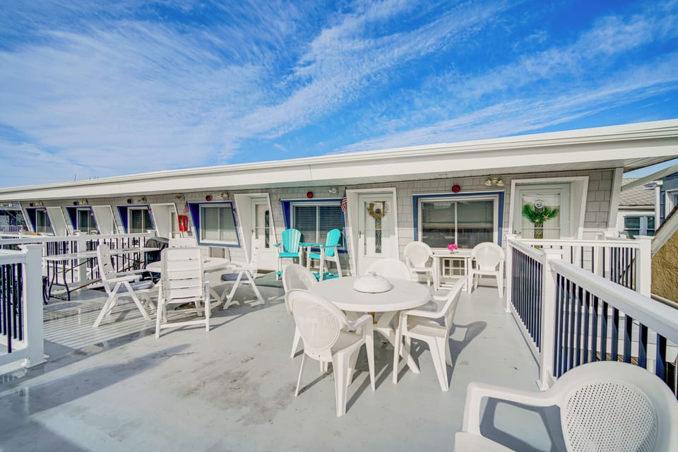 Property Exterior | Communal Deck w/ Gas Grill