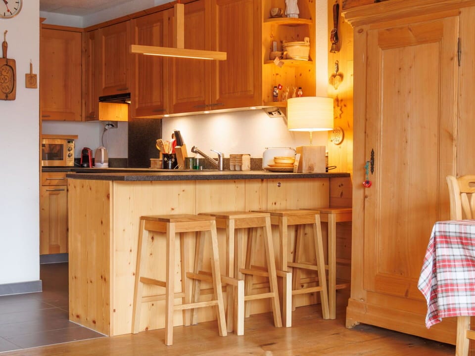 Furniture, Wood, Kitchen, Flooring, Interior Design, Countertop, Cabinetry, Wood Stain, Floor, Hardwood