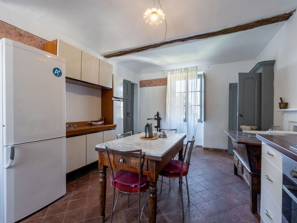 Furniture, Flooring, Interior Design, Kitchen, Wood, Floor, Countertop, Major Appliance, Kitchen Appliance, Cabinetry