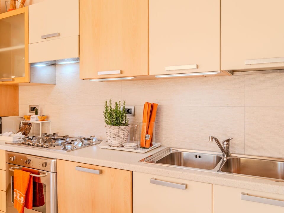 Kitchen, Countertop, Kitchen Appliance, Kitchen Sink, Major Appliance, Cabinetry, Wood, Interior Design, Home Appliance, Furniture