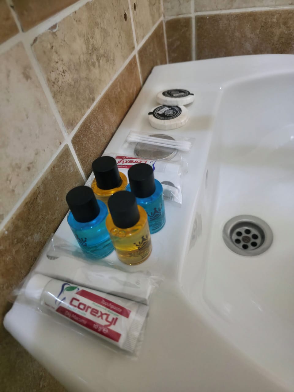 Shower, slippers, towels, shampoo