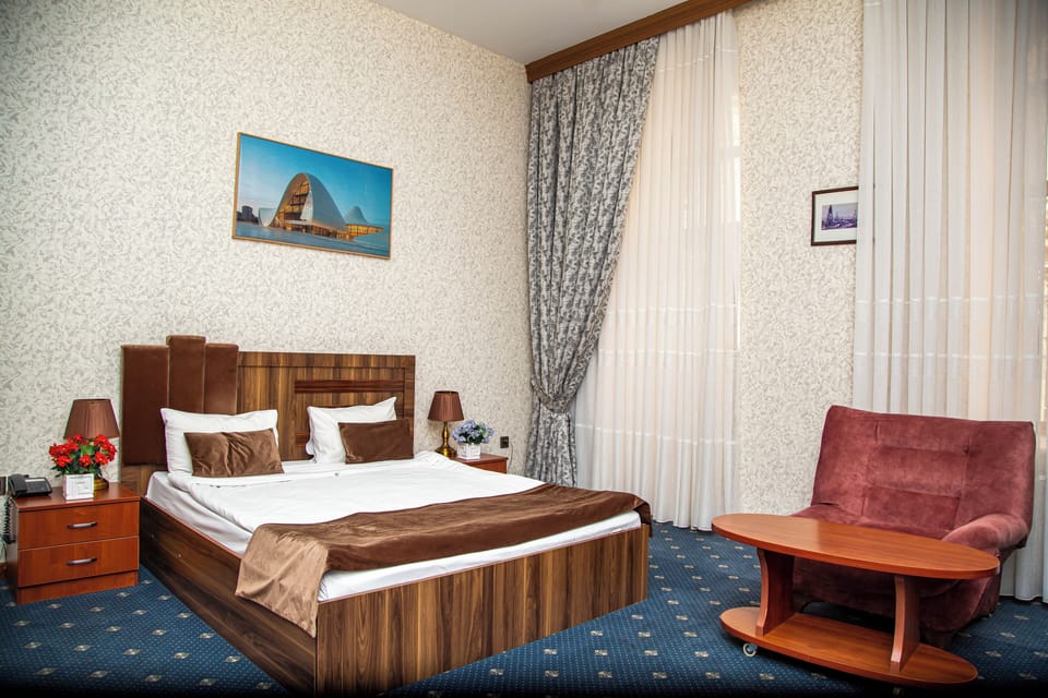 Deluxe Double Room, Balcony | Premium bedding, desk, blackout drapes, iron/ironing board