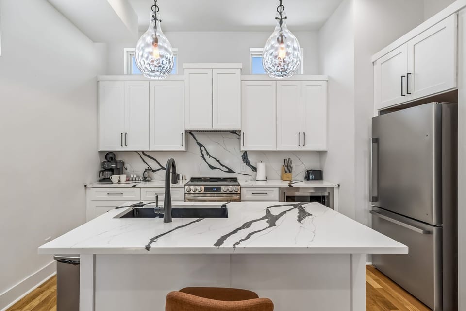 Kitchen: Bright and clean kitchen featuring modern appliances and plenty of space for cooking.