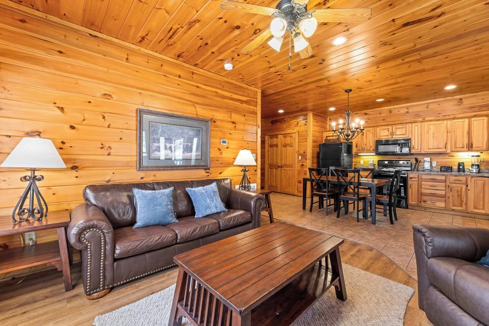 Living area with sofa sleeper, electric fireplace, and Smart TV