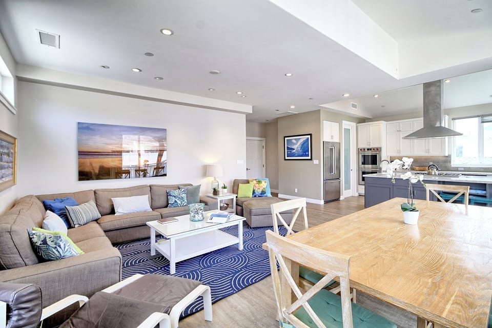 Open-concept dining, living, and kitchen space designed for comfort, style, and togetherness