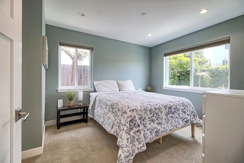Guest bedroom with a full bed