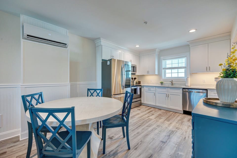 Your bright, fully-equipped kitchen awaits with stainless steel appliances, ample counter space, and a cozy dining area for memorable meals together.