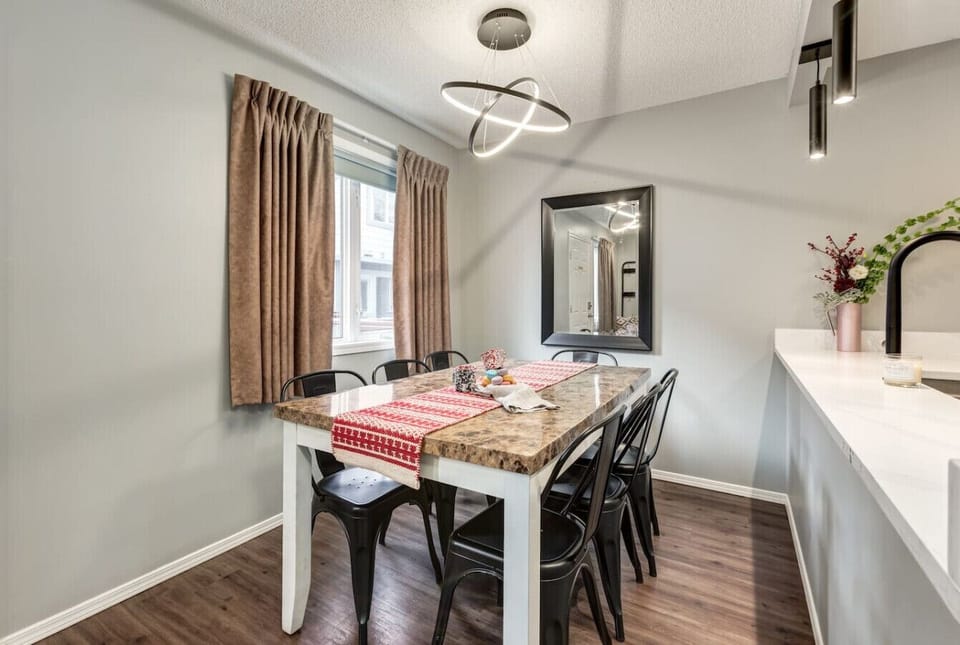 Enjoy a meal at the dining table.