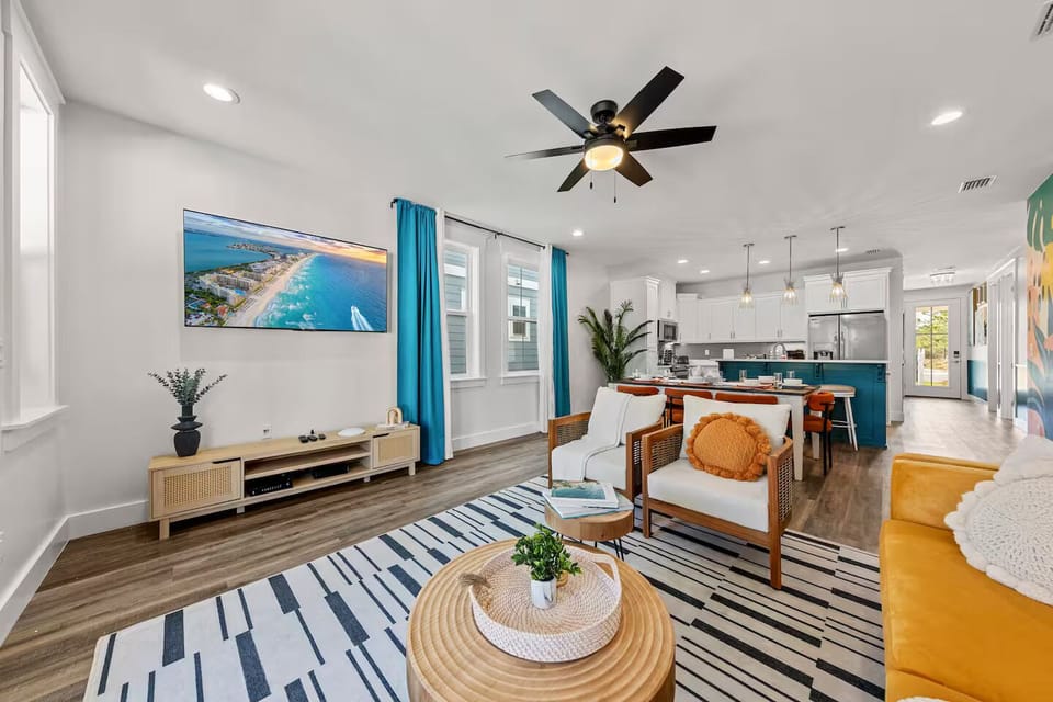 Full view of the living room and kitchen.