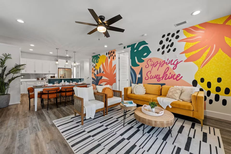 A cozy space perfect for lounging, sleeping, or napping while sharing laughs, all within a room that offers a complete, inviting view.