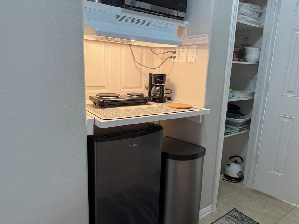 Small kitchenette for light meal preparation.