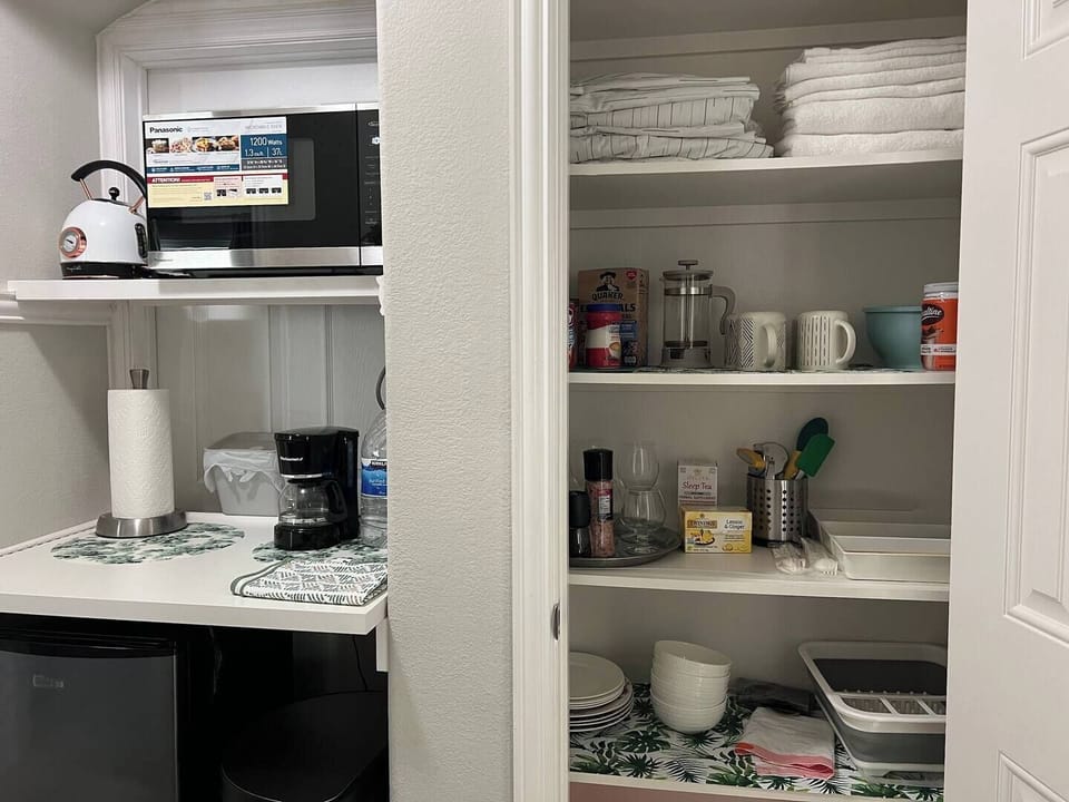 Kitchen essentials, cookware, and extra supplies.