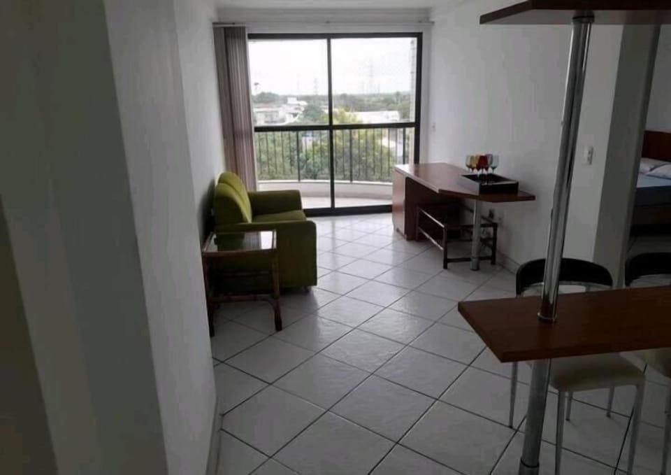 Basic Apartment, Lanai, City View | Living area | 32-inch LED TV with cable channels