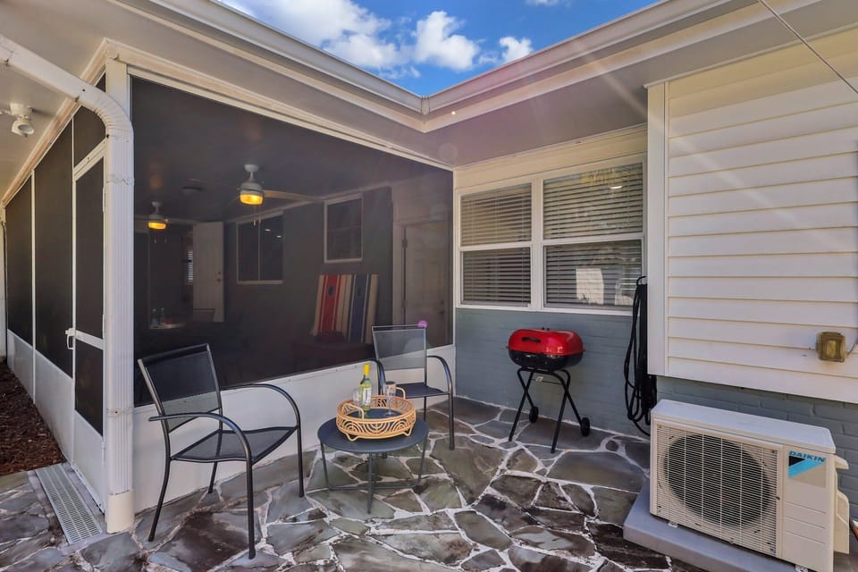 Back Patio with cocktail seating and charcoal grill