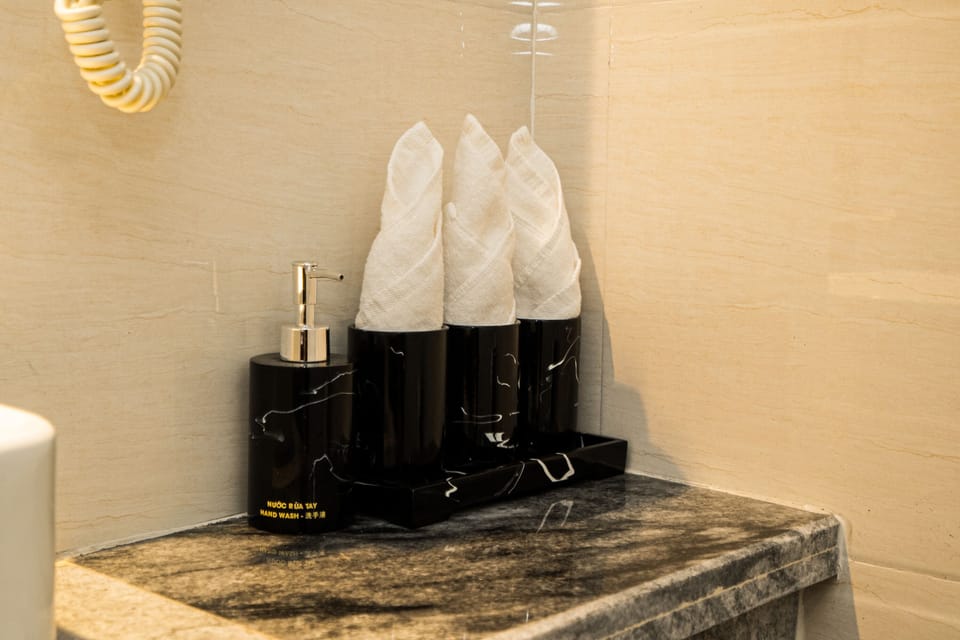 Deluxe Triple Room, City View | In-room safe, desk, blackout drapes, free WiFi