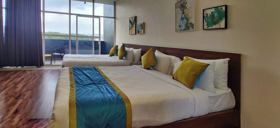 Premium bedding, laptop workspace, iron/ironing board, rollaway beds