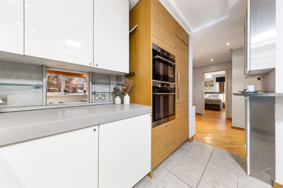Modern kitchen with state-of-the-art appliances and ample storage.