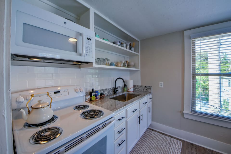 Kitchen - The kitchen is fully equipped to cook meals.