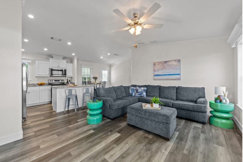 Spacious seating, vibrant decor, and a perfect spot for movie nights!