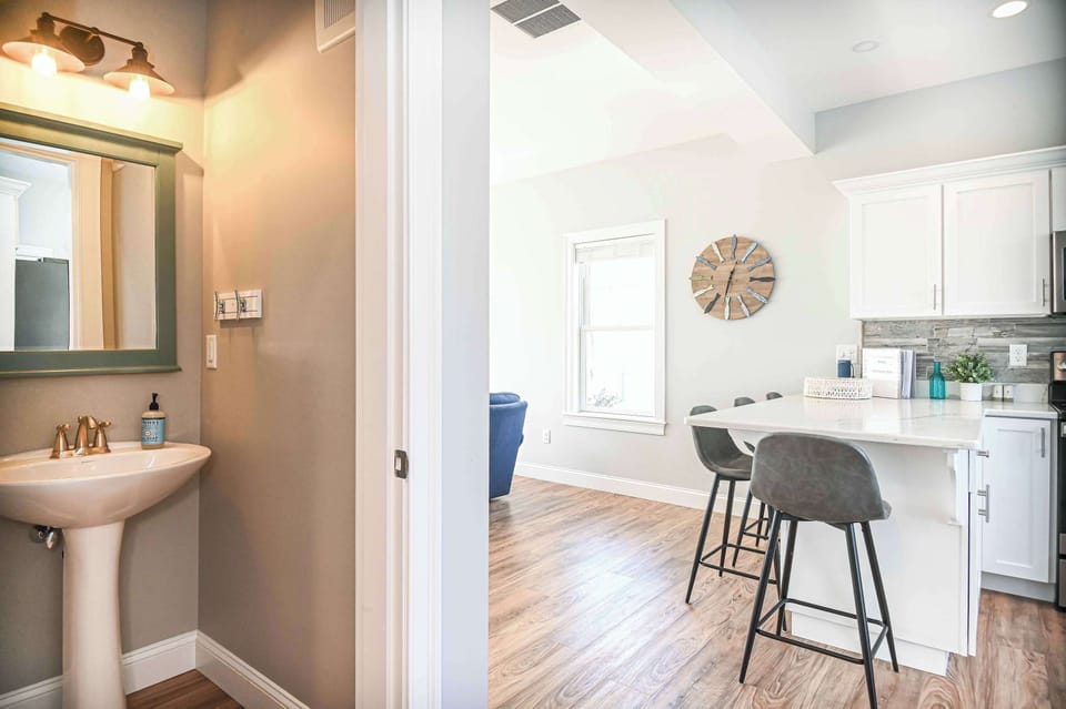 A convenient half bath is available on the first floor