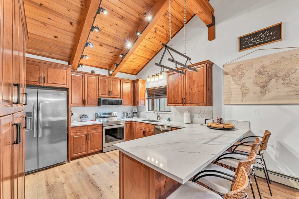 Kitchen 1: Drip coffee maker, toaster, cooking utensils, tableware, main floor
