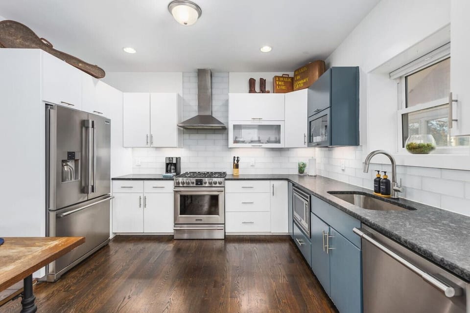 Unit B - Fully-equipped kitchen with stainless steel appliances and all the utensils you'll need to make a great meal.