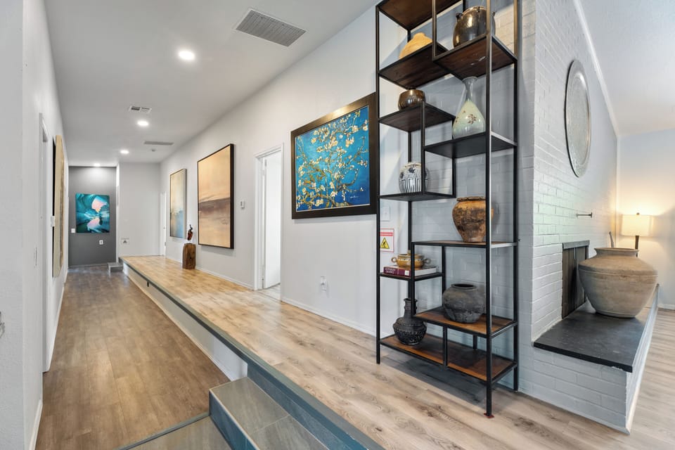 Explore the charm of this modern hallway that connects thoughtfully designed spaces for your ultimate comfort.