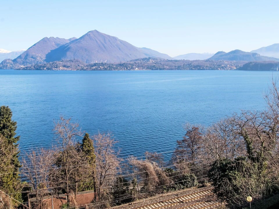 Sky, Blue, Water, Water Resources, Mountainous Landforms, Body Of Water, Mountain, Natural Landscape, Hill, Highland