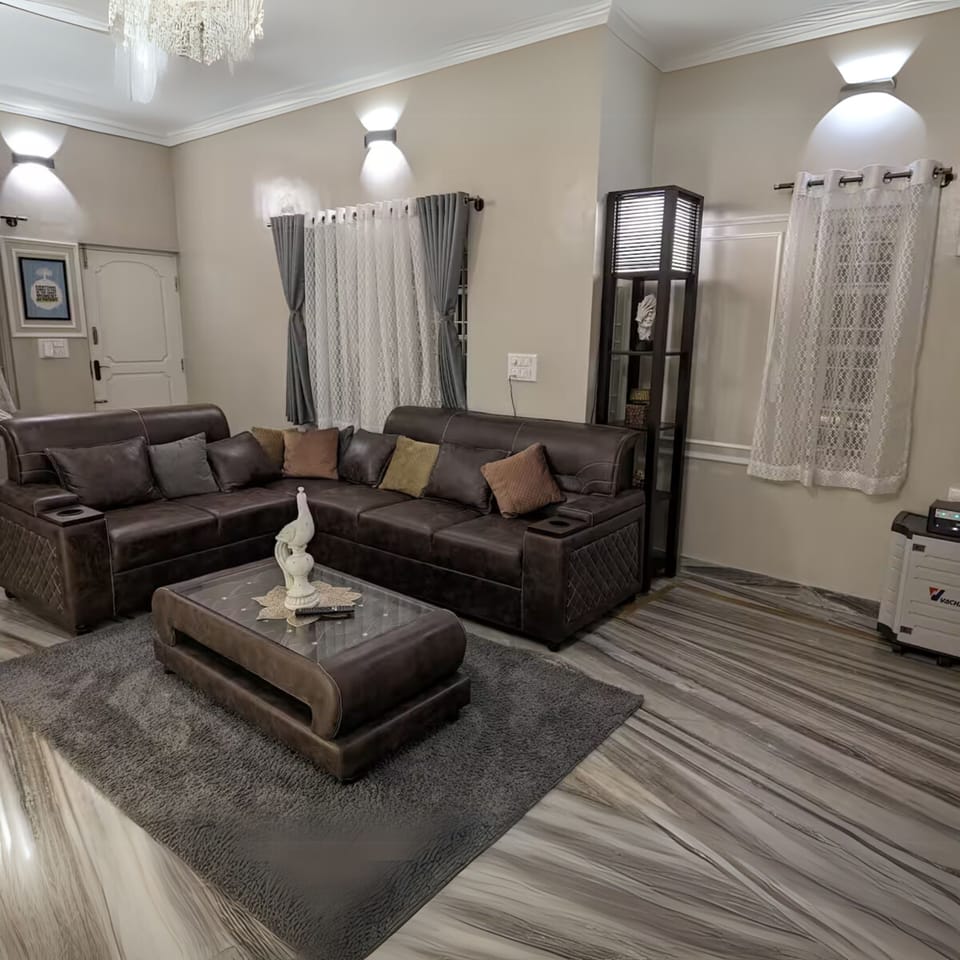 Luxury Apartment | Living area | Flat-screen TV