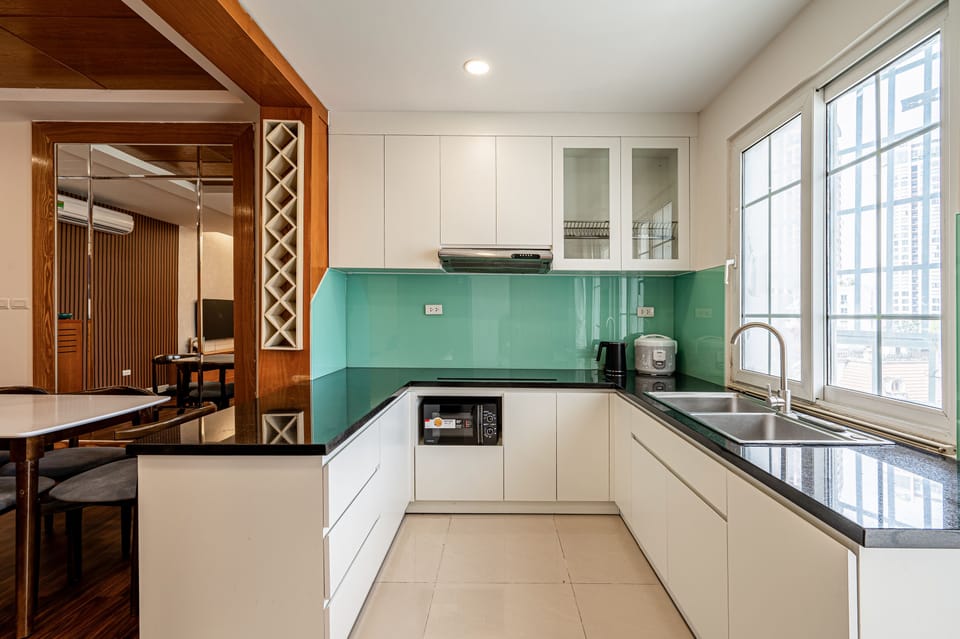 Luxury Apartment, City View | Private kitchen | Fridge, microwave, oven, stovetop