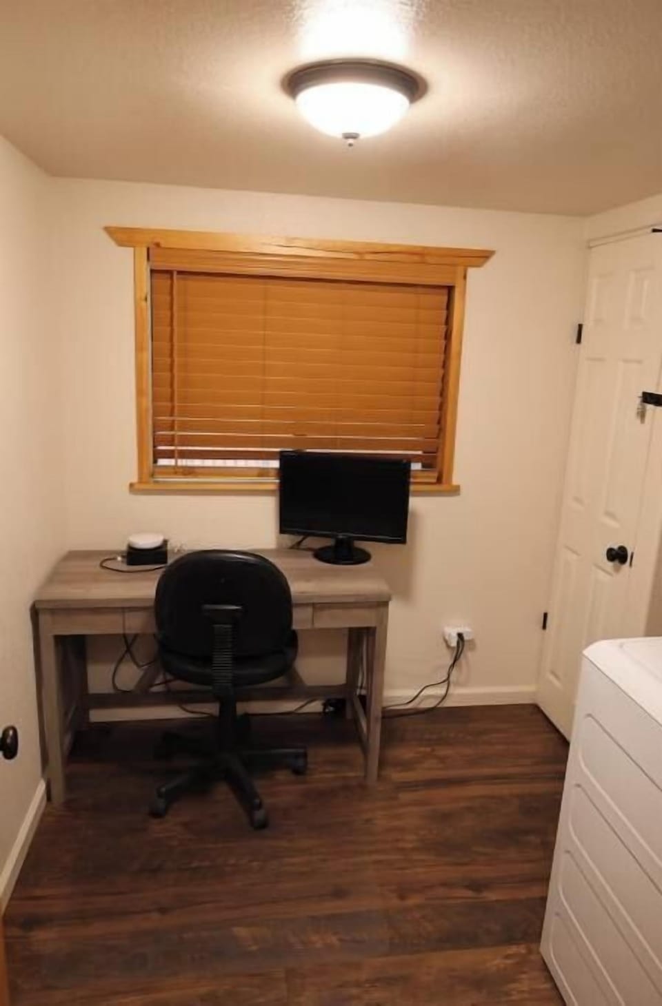 Laundry room with office area.