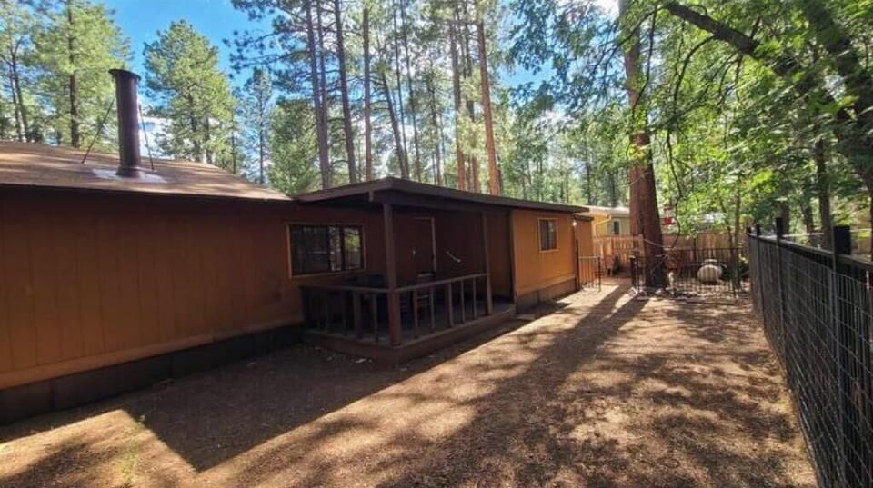 Backyard with covered patio.