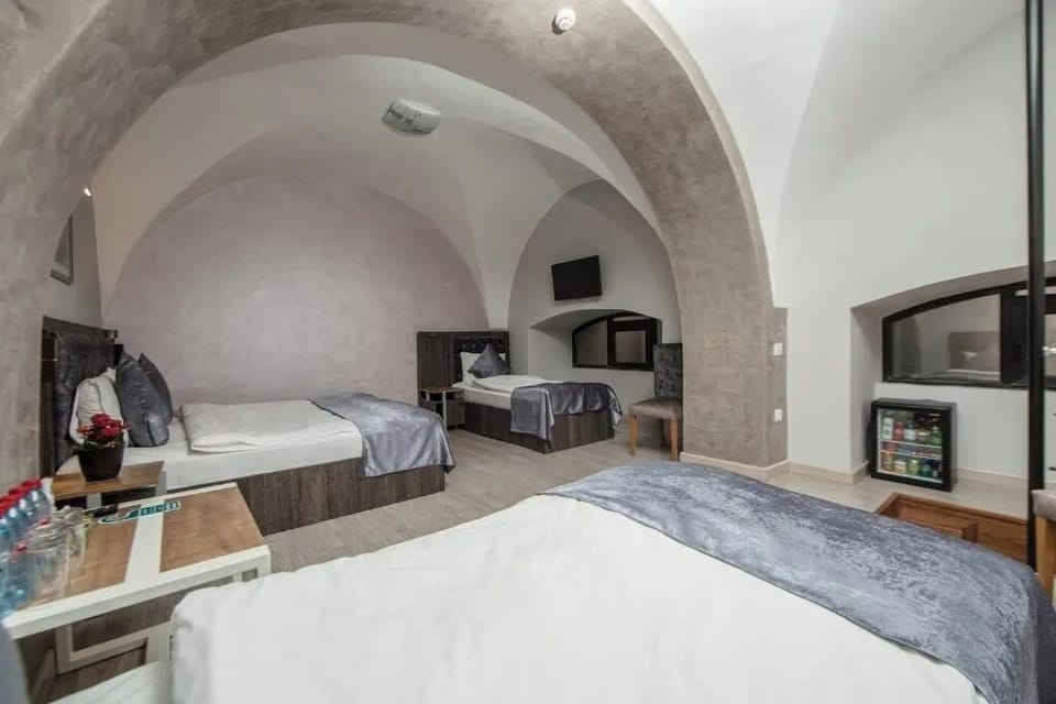 Family Duplex, Balcony, City View | Premium bedding, minibar, in-room safe, individually decorated