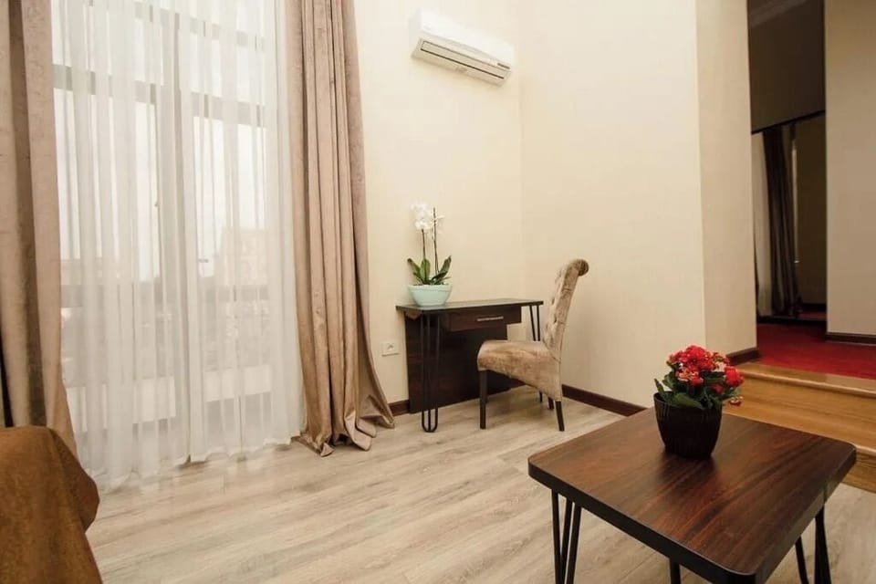 Deluxe Double Room, Balcony, City View | Premium bedding, minibar, in-room safe, individually decorated