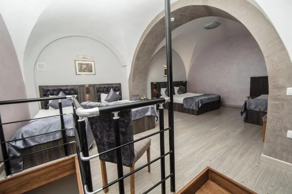 Family Duplex, Balcony, City View | Premium bedding, minibar, in-room safe, individually decorated
