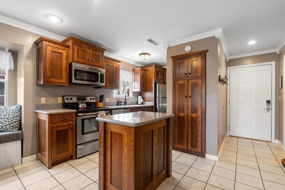 Feel right at home in your warm and welcoming kitchen, complete with all the amenities you need to cook and enjoy delicious meals during your stay