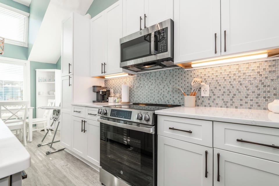 Fully equipped kitchen with stainless steel appliances