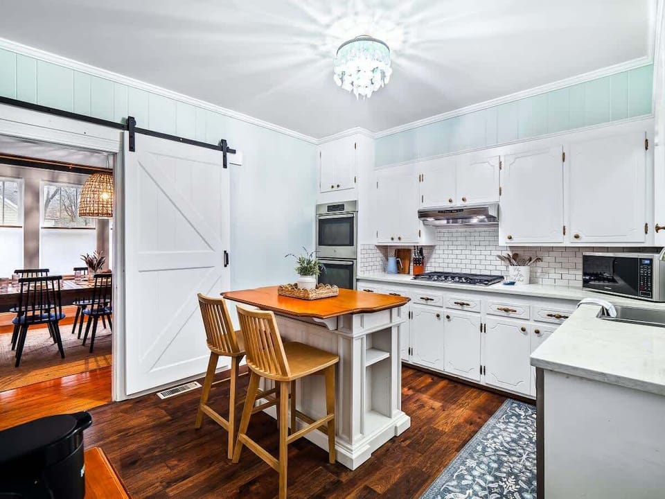 Spacious kitchen w/ open layout & central island for easy flow