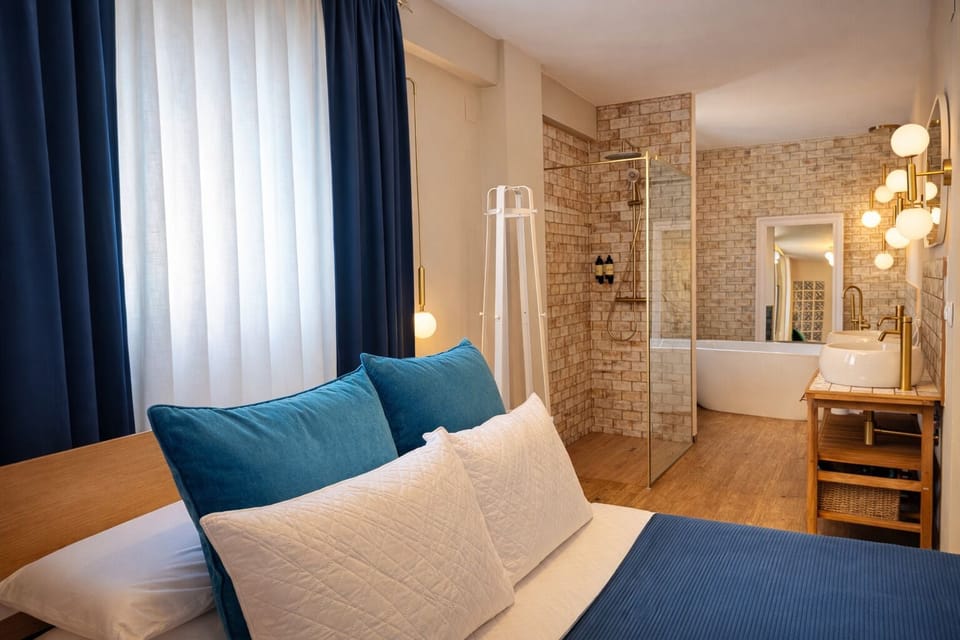Down comforters, memory foam beds, desk, free WiFi