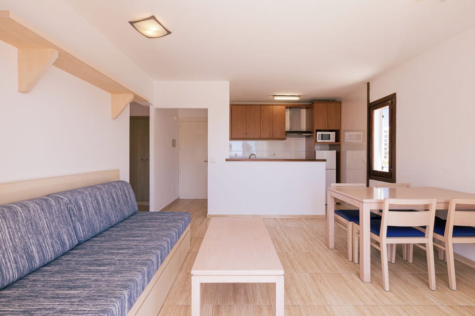 Apartment, 1 Bedroom | Living area | Flat-screen TV