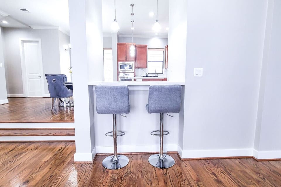 Modern yet luxury style living room with huge windows accompanied by a spacious balcony!