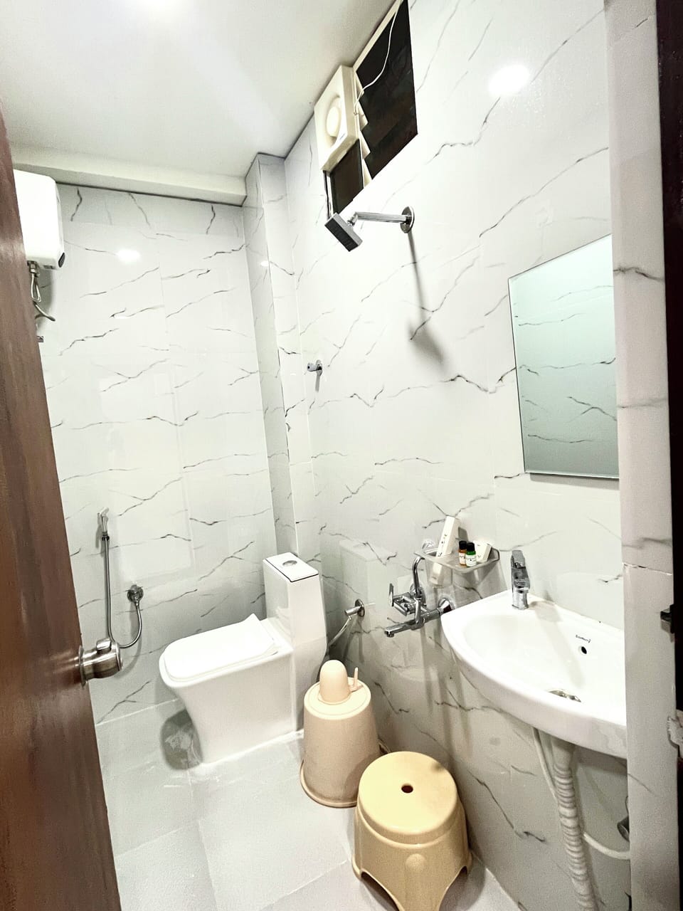 Shower, slippers, towels, soap