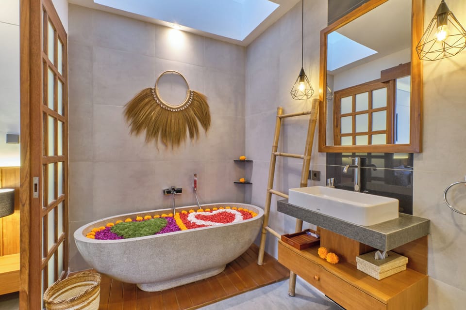 Separate tub and shower, towels, soap, shampoo