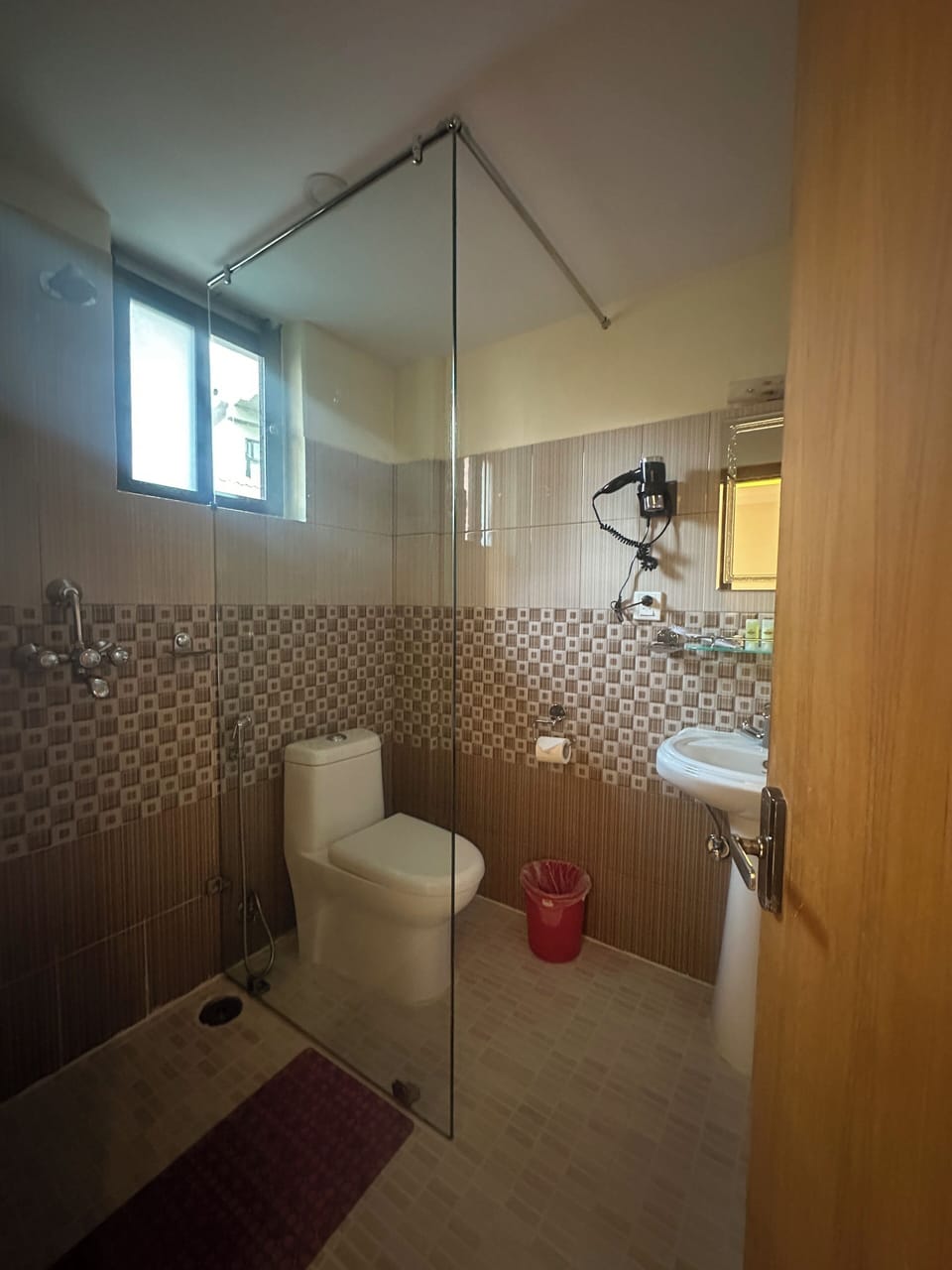 Shower, hair dryer, slippers, towels