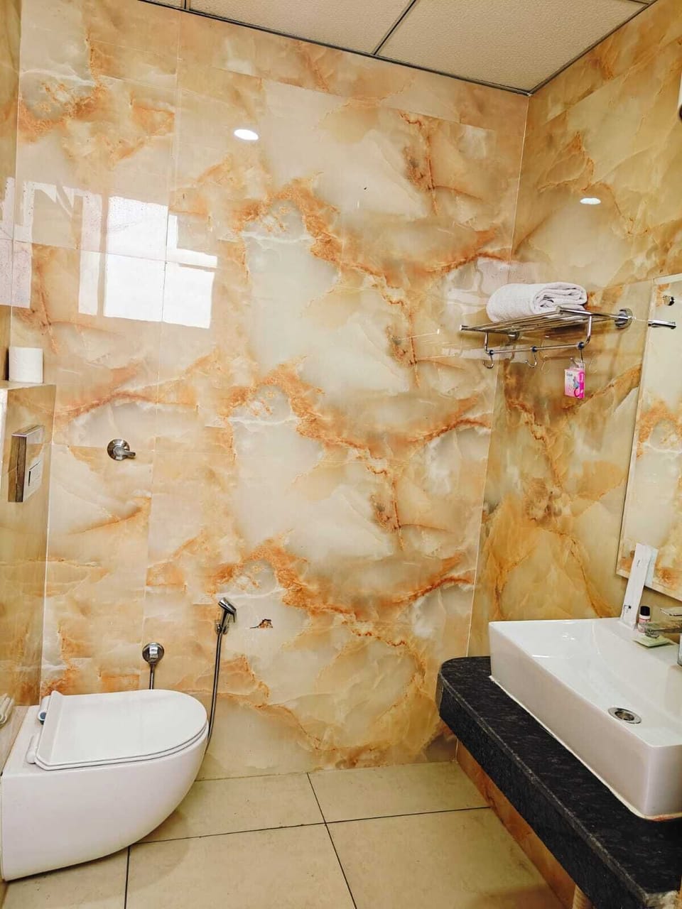Shower, slippers, towels, soap