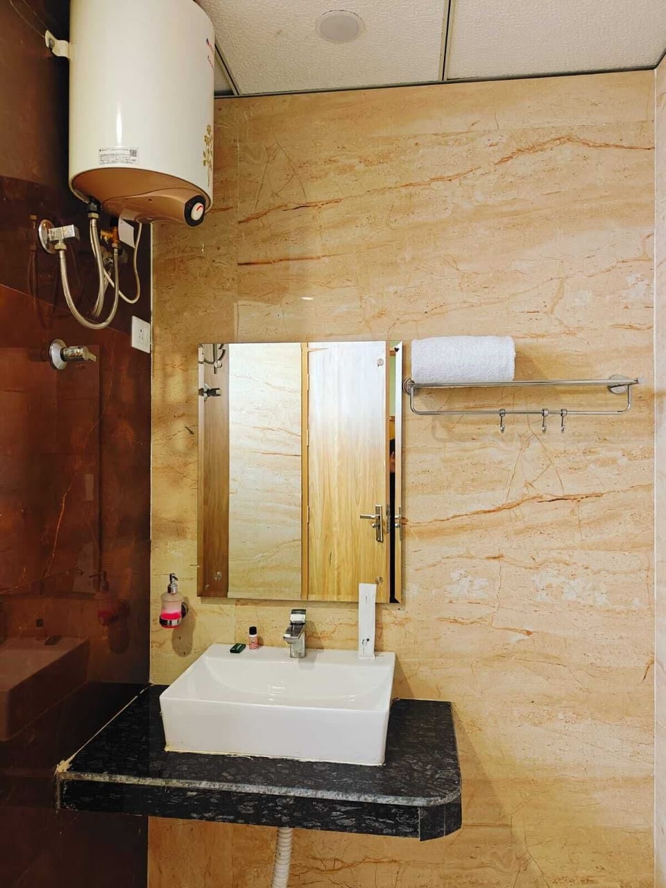 Shower, slippers, towels, soap