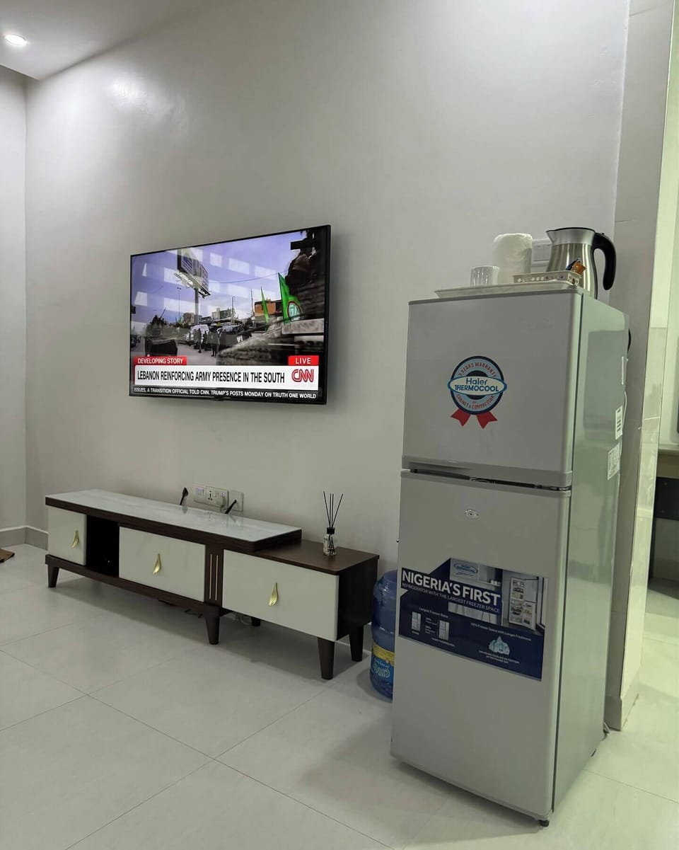 Luxury Apartment, Balcony, City View | Living area | Flat-screen TV